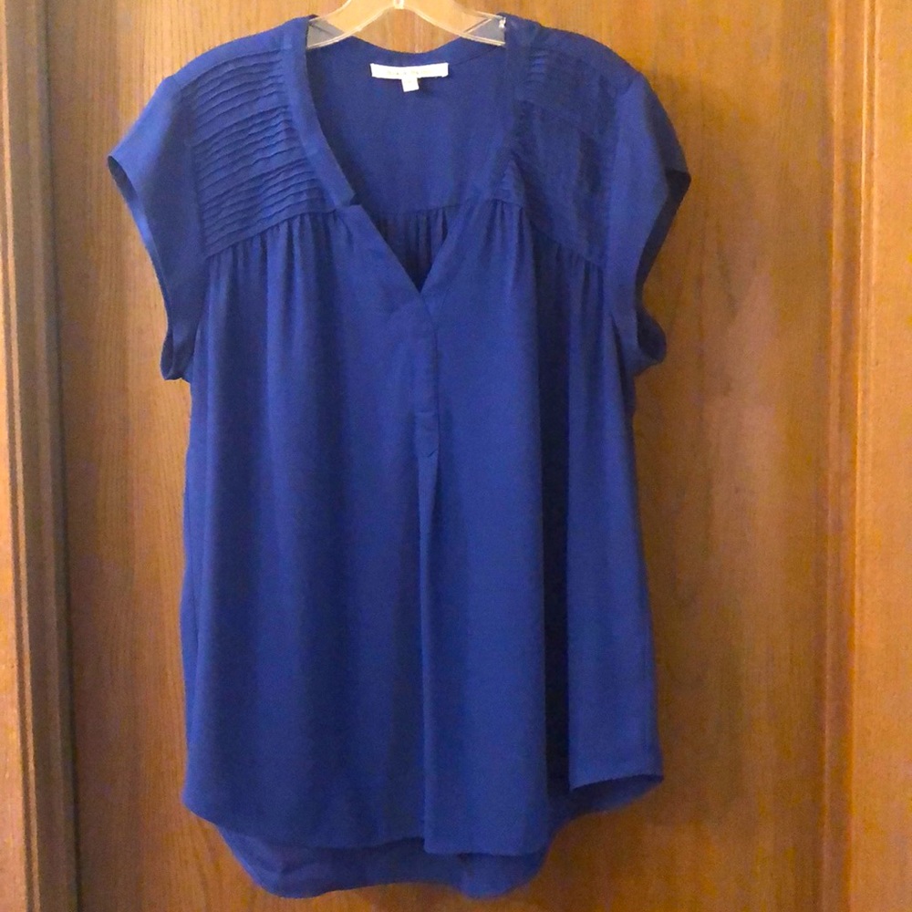 Blue Thin blouse but not see through.
